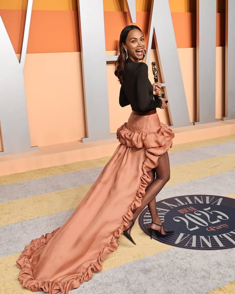 zoe saldana brown dress Zoe Saldana stuns in body-clinging brown midi for GMA appearance